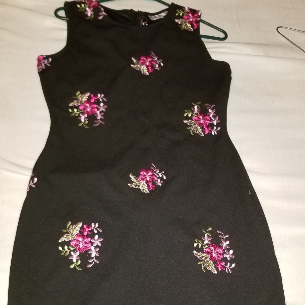 Black dress with embroidered pink flowers
